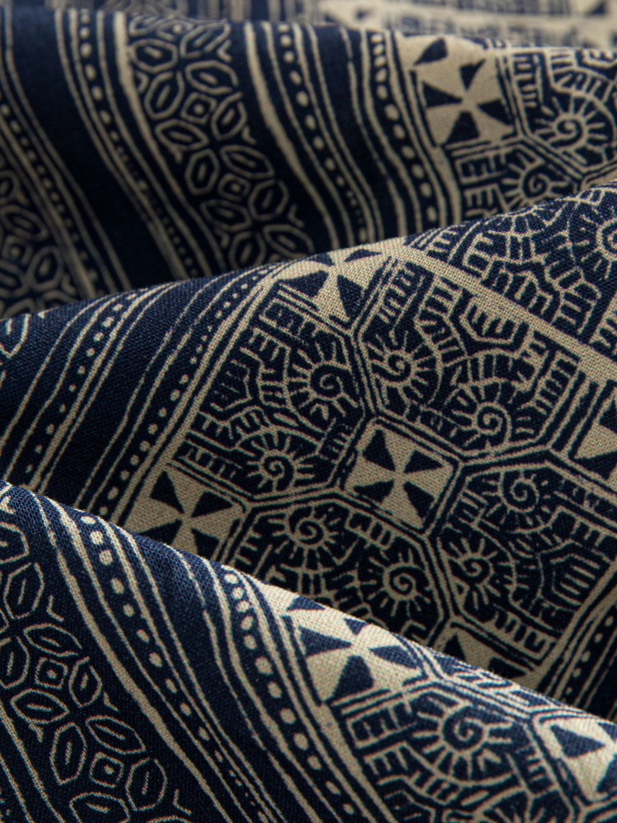 100% cotton indigo batik stripe print fabric texture detail of OROMEN Shirt