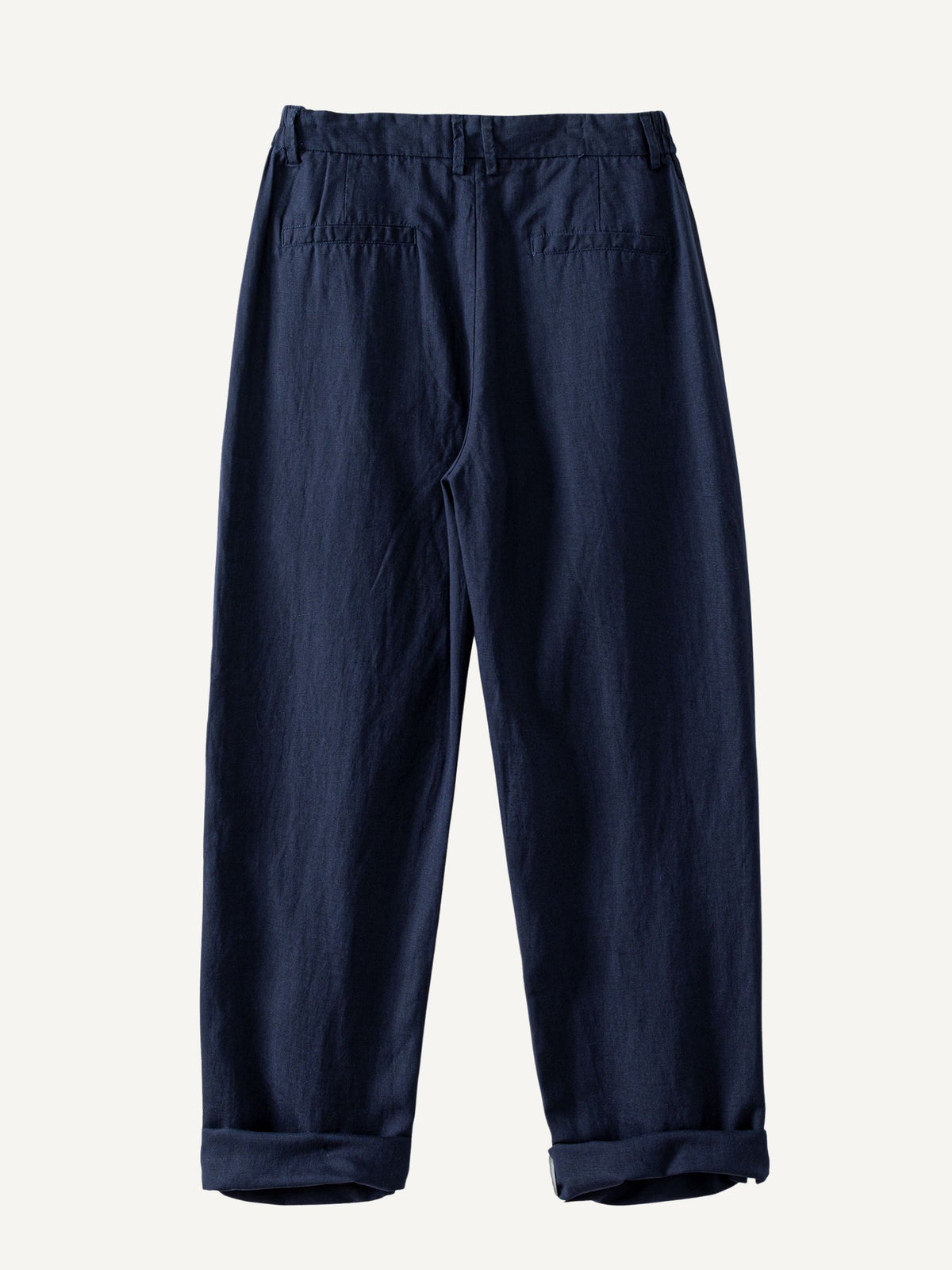 Back flat lay view of OROMEN Pleated Relaxed Fit Linen Trousers in Navy
