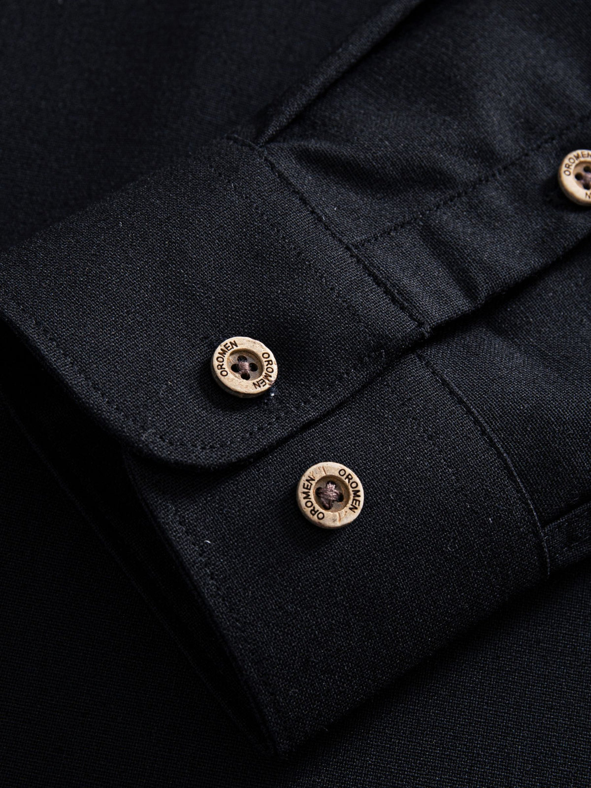 Button cuff detail on OROMEN Ink Wash Cotton-Linen Shirt