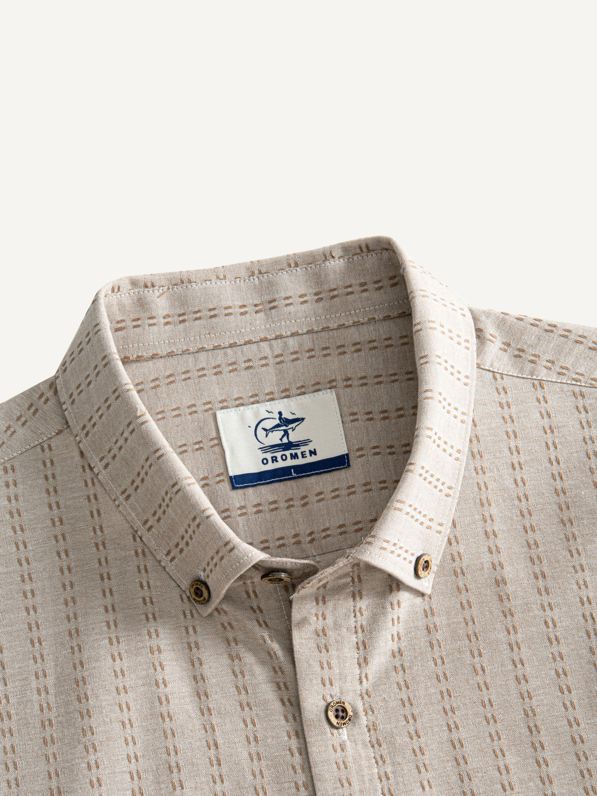Button-down collar and neckline detail of OROMEN Sashiko Stripe Cotton Shirt
