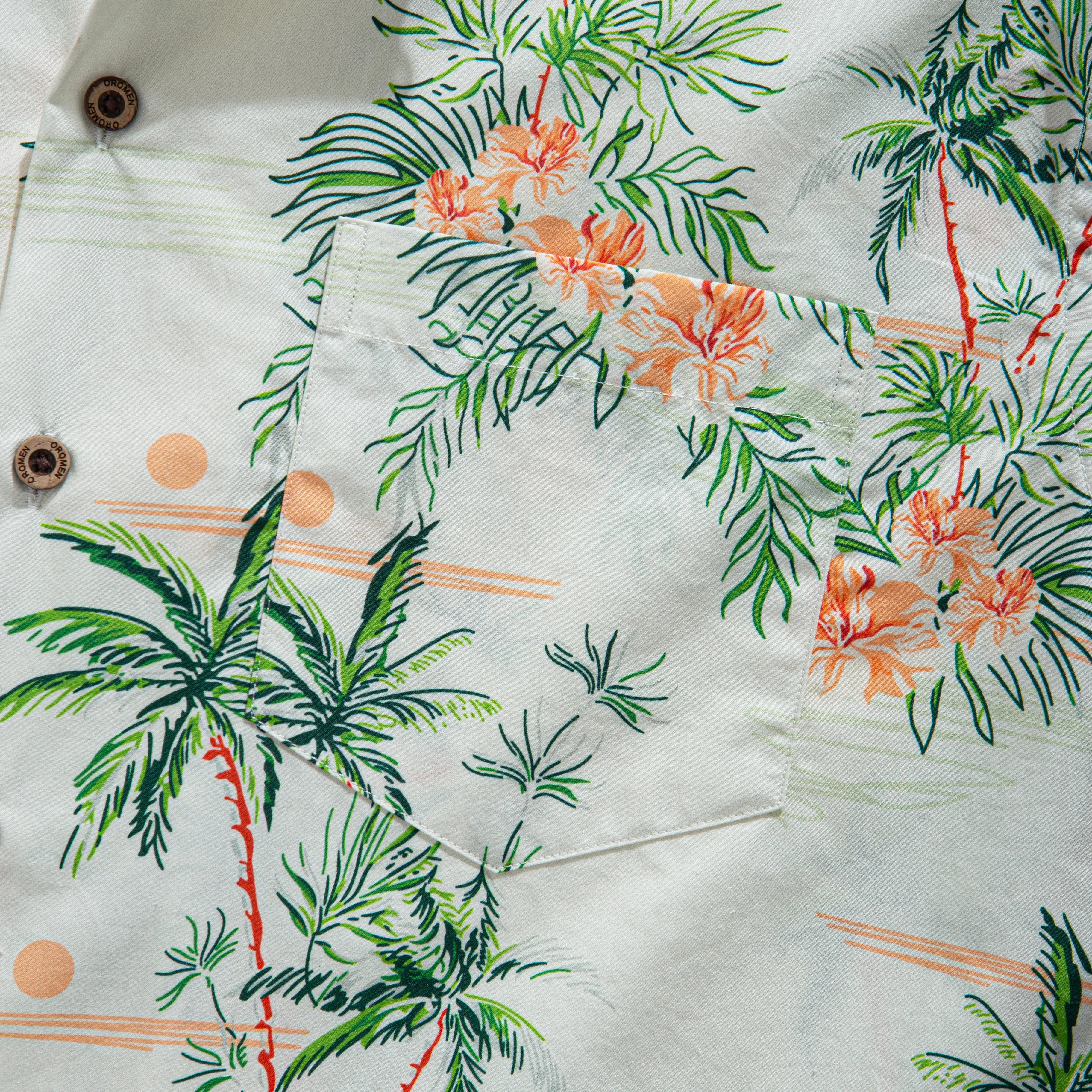 Camp collar detail with coconut tree print on OROMEN Elegant shirt