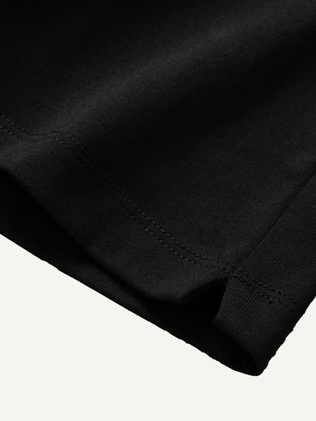 Clean double-stitched bottom hemline detail of OROMEN Banana Embroidery Tee