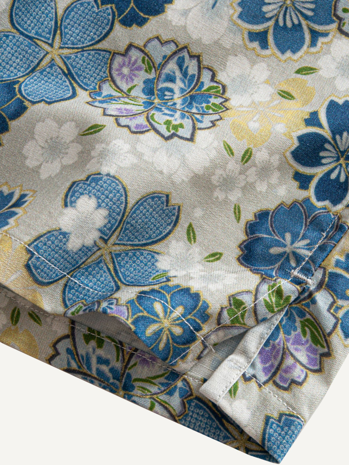 Clean hemline and side vent detail of OROMEN Cherry Blossoms in Full Bloom Shirt