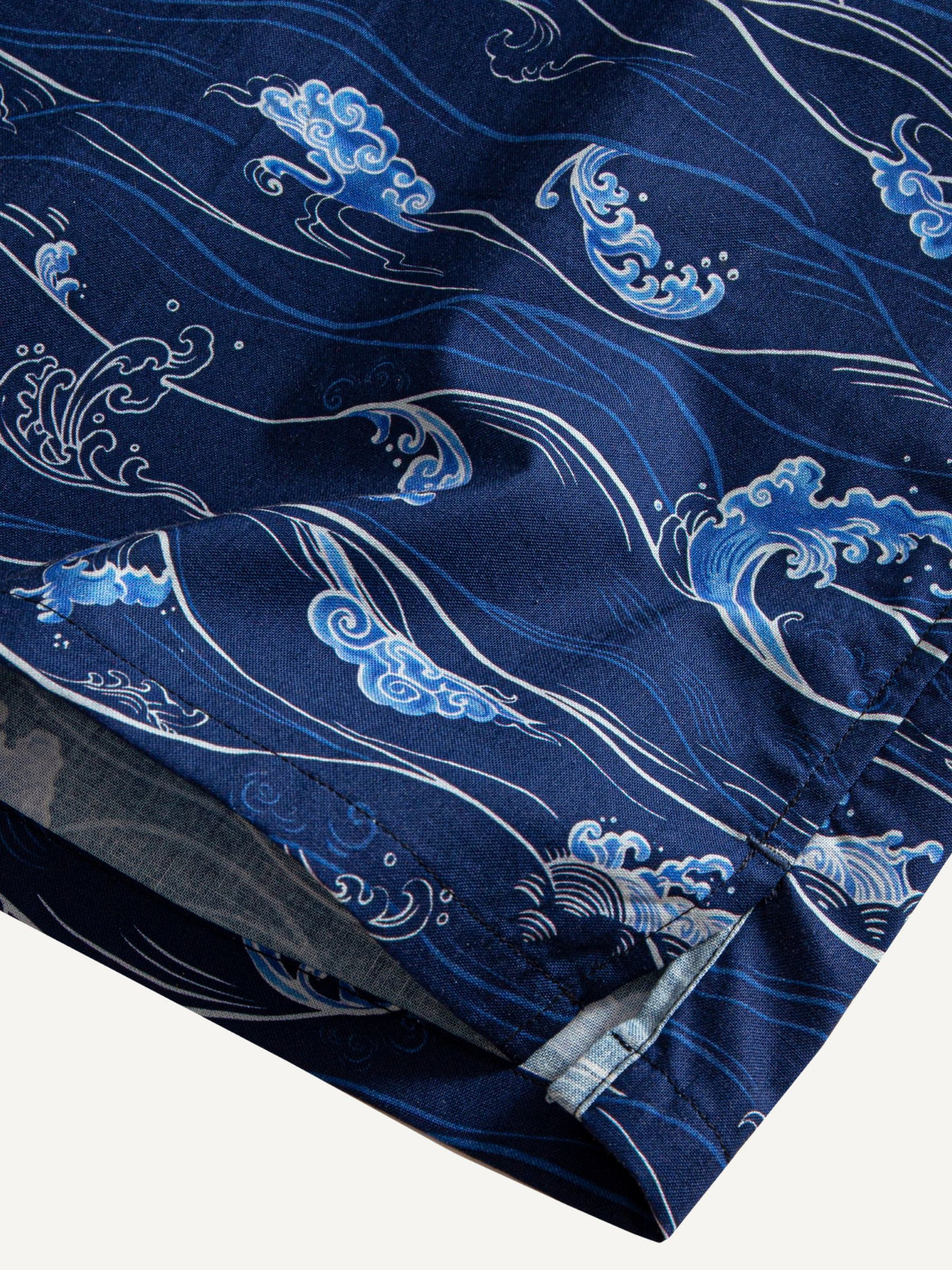 Clean hemline and side vent detail of OROMEN Hokusai Kairin Shirt