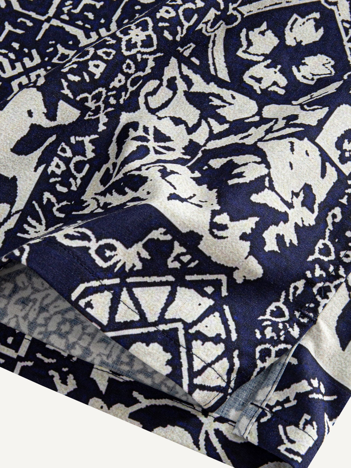Clean hemline and side vent detail of OROMEN Indigo Katazome Shirt
