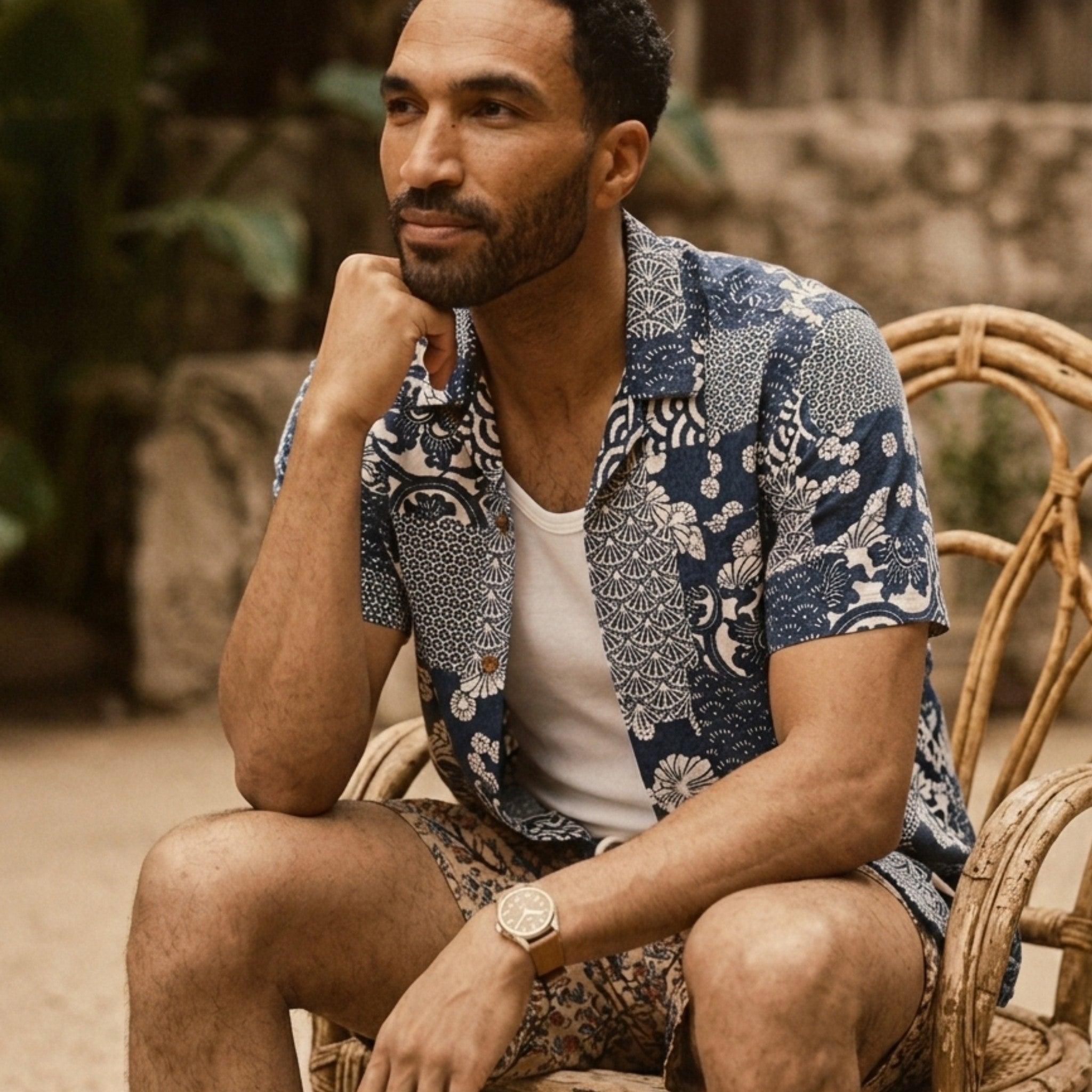 Close-up of a navy cotton button-down shirt with traditional Japanese floral