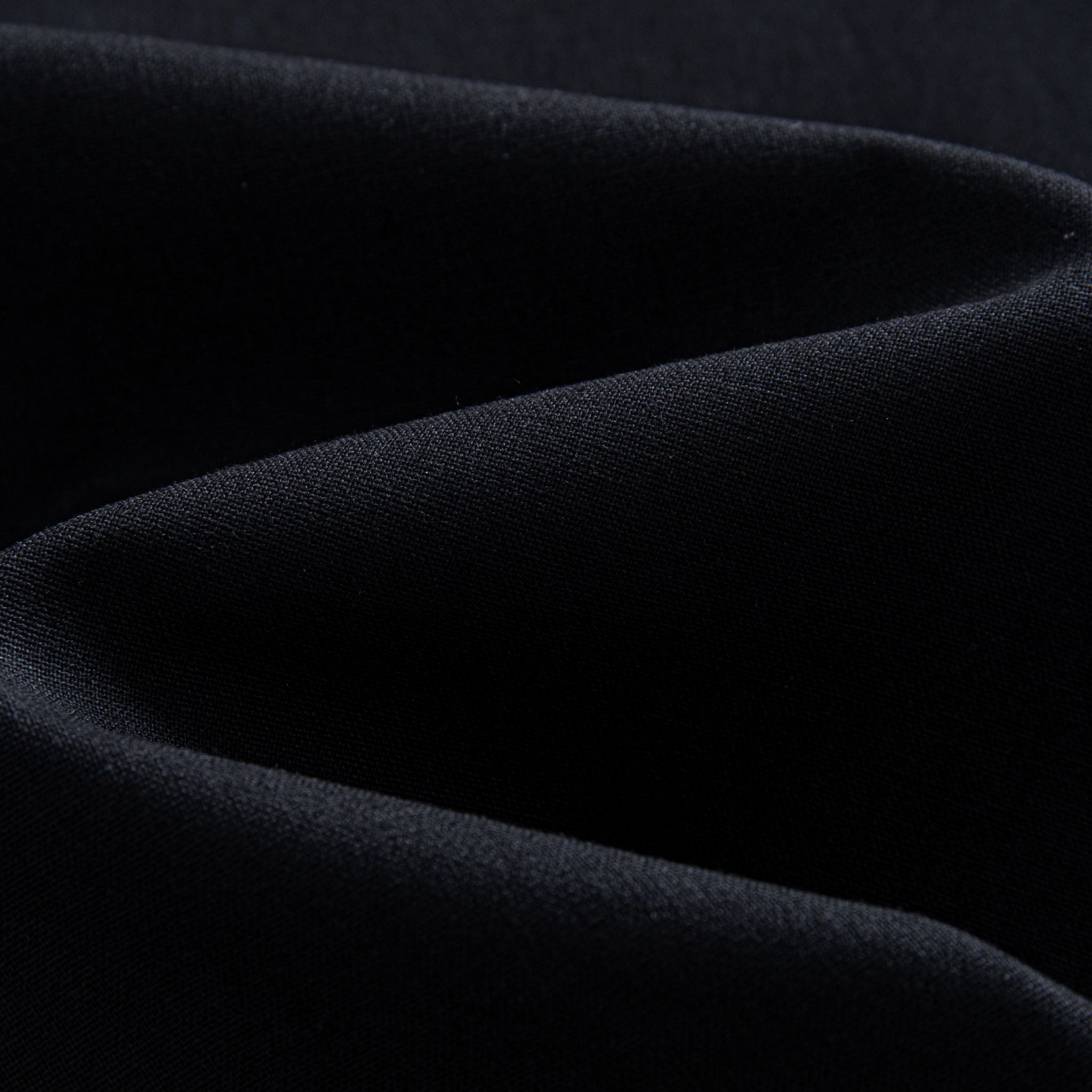 Close-up of black linen-cotton woven fabric texture, OROMEN long-sleeve shirt