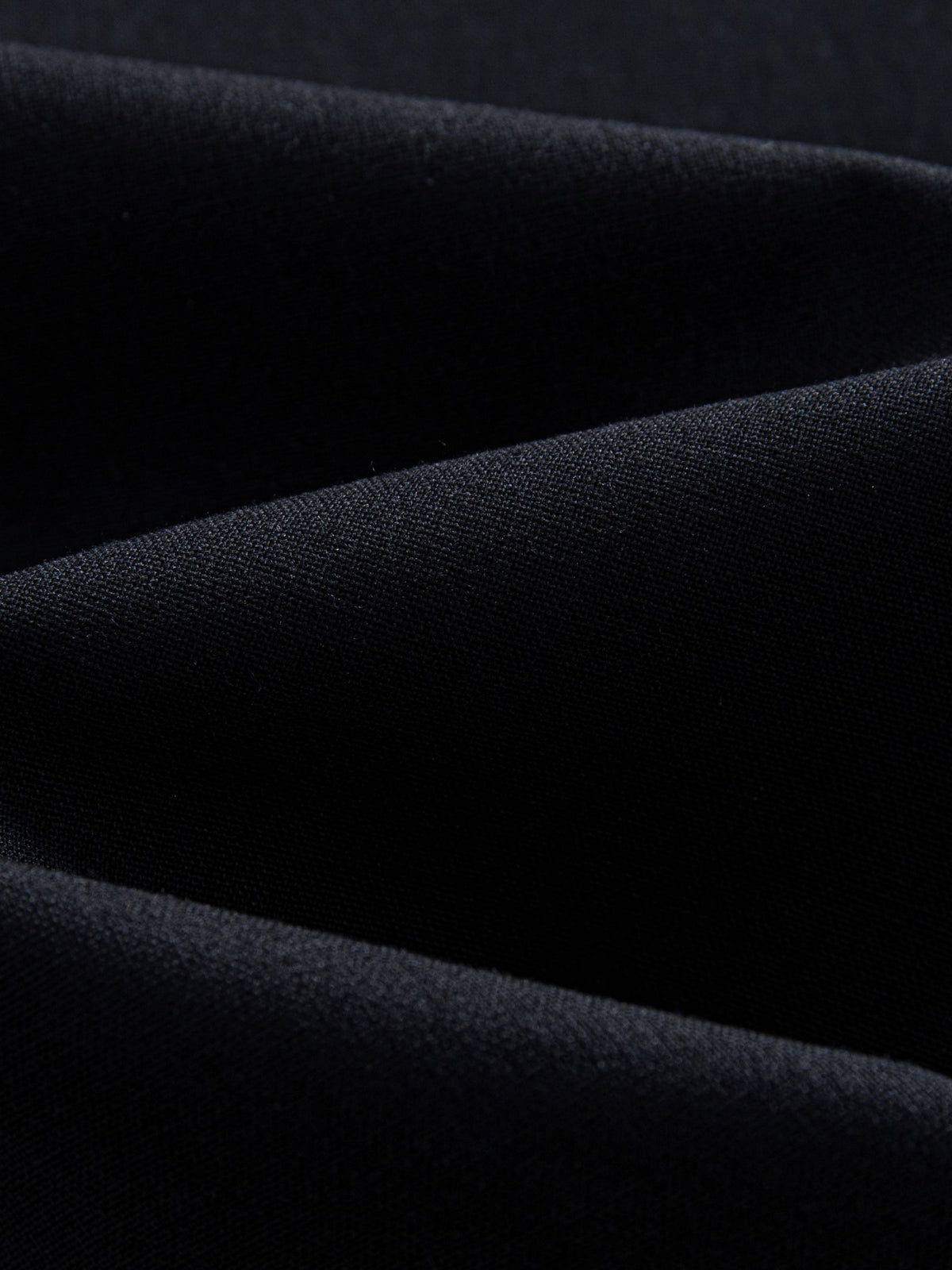 Close-up texture of porous weave cotton-linen fabric on OROMEN Ink Wash Cotton-Linen Shirt