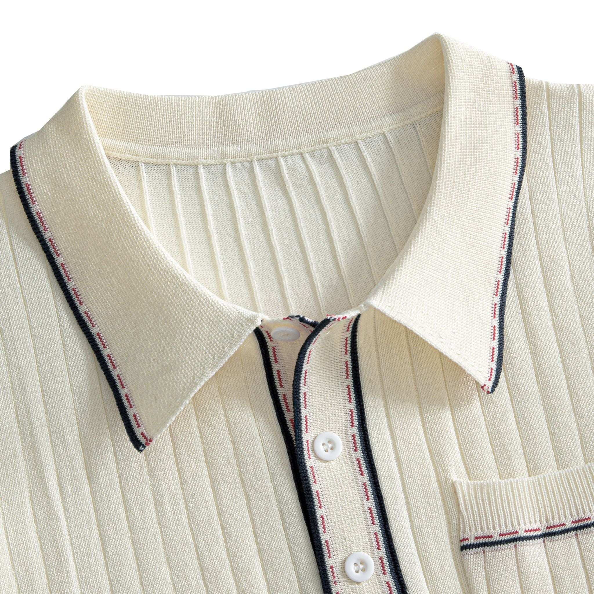 Close-up of polo collar on cream knit shirt, navy and rust contrast
stripe tipping detail, 2-button placket, fine ribbed knit construction