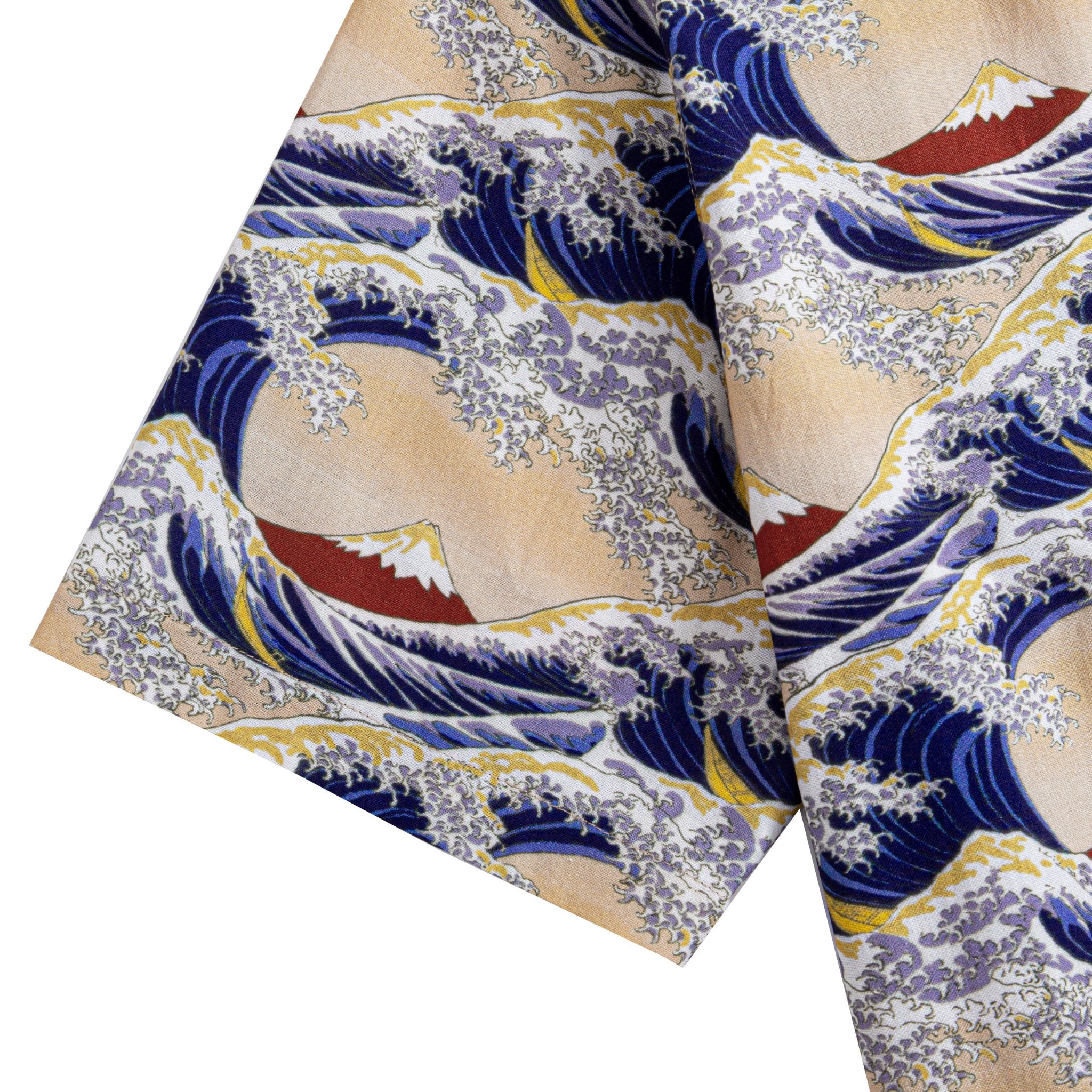 Detail of hand-painted Hokusai wave pattern with frothy white crests on premium cotton
