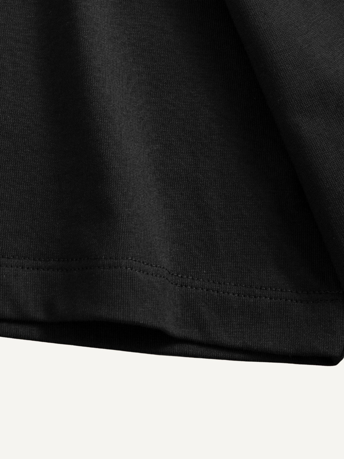 Double-stitched sleeve cuff and seam detail of OROMEN Psychedelic Mushroom T-shirt