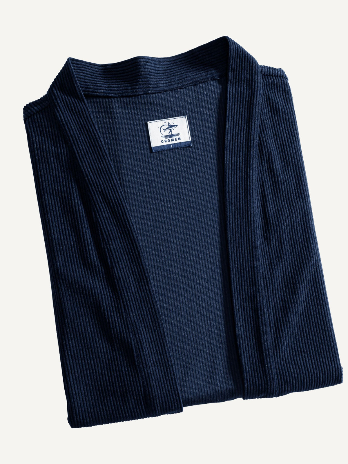 Folded flat lay of OROMEN Mottainai corduroy haori kimono jacket