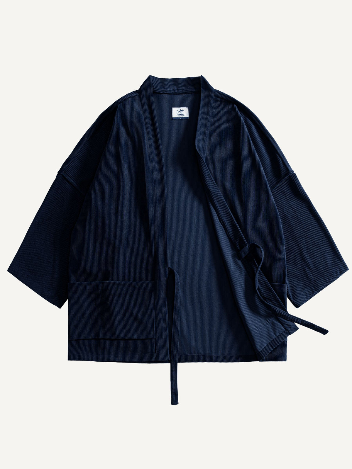 Front flat lay of OROMEN Mottainai corduroy haori kimono jacket with one side open