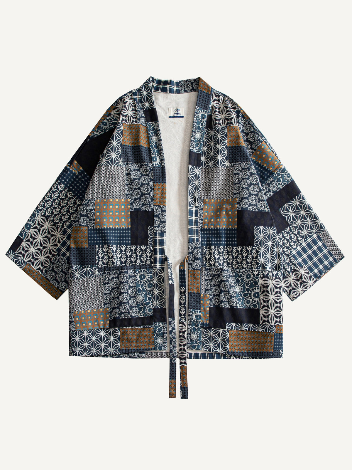 Front flat lay view of OROMEN Indigo Asanoha Patchwork Haori Jacket in 100% cotton with traditional Japanese motifs
