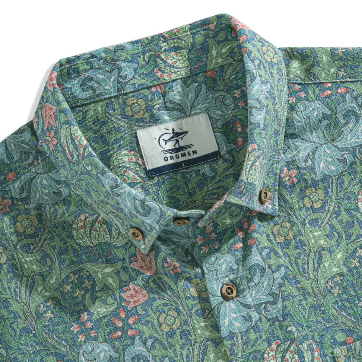 Intricate hand-painted botanical florals on Secret Garden Hawaiian shirt