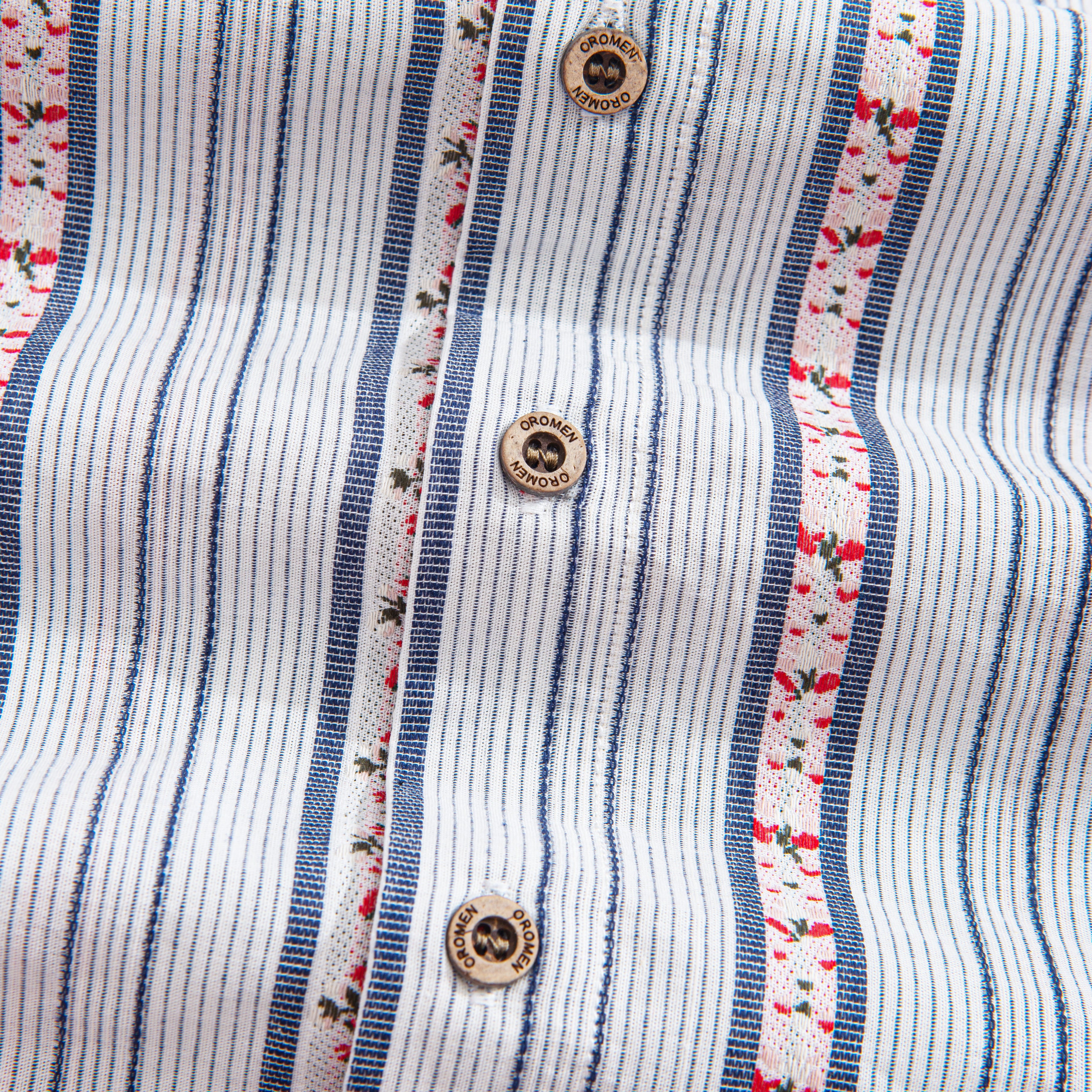 Men wearing embroidered floral striped casual shirt with button-down collar