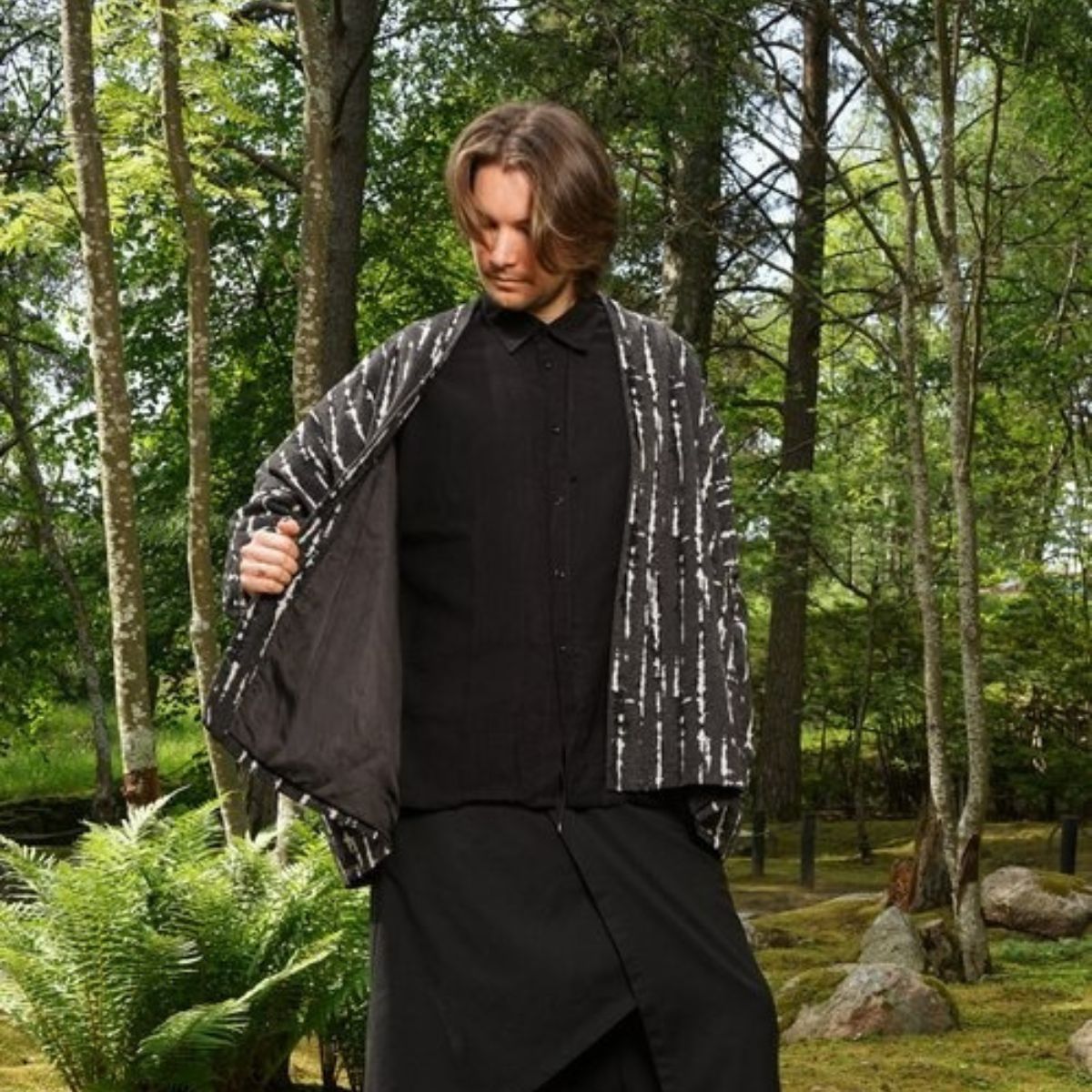 Model showing interior and exterior of OROMEN Crackle Kimono Jacket, contrast lining detail
