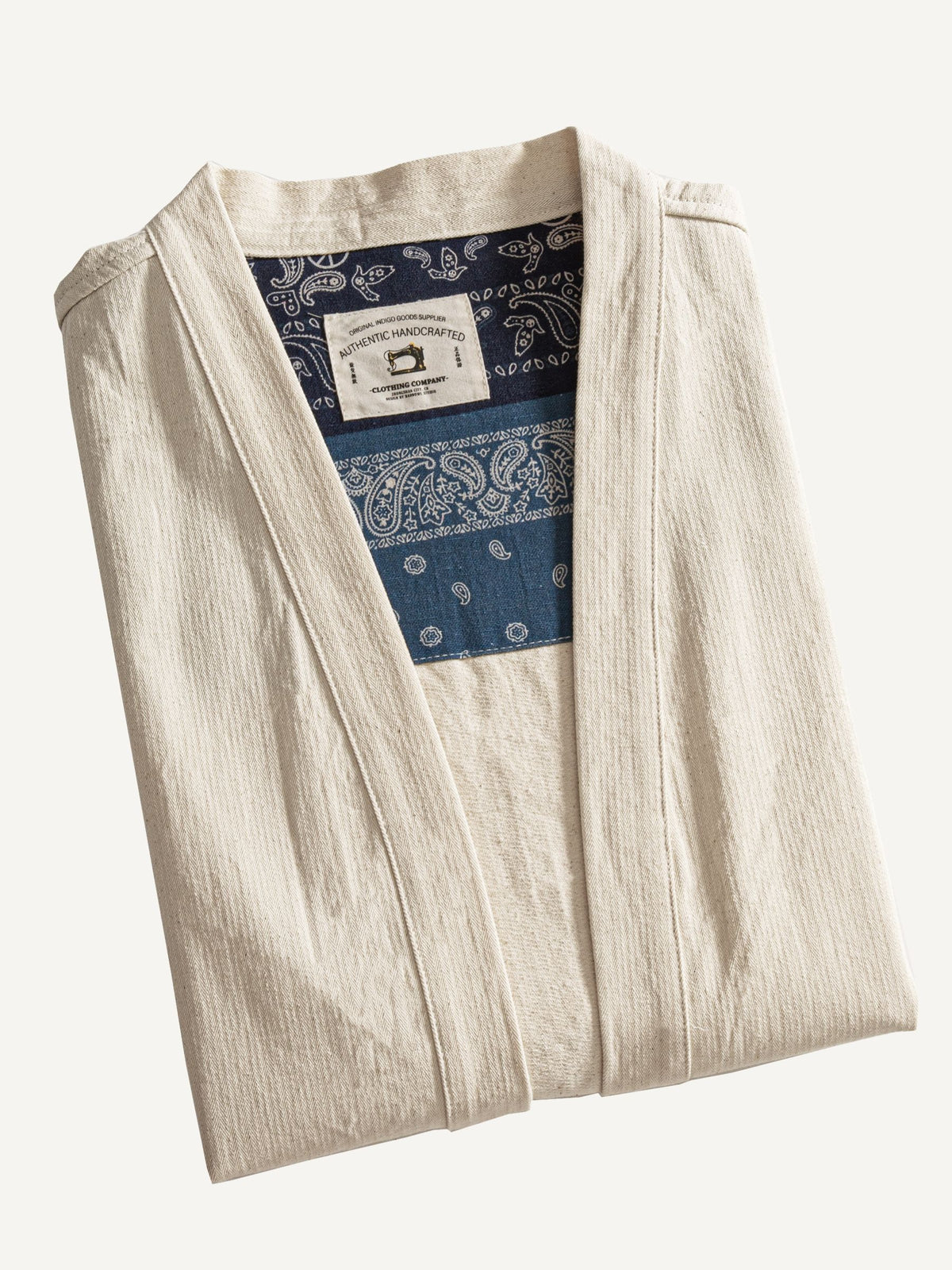 Neatly folded OROMEN Vintage-Style Kimono Cardigan Jacket highlighting collar and slub cotton texture