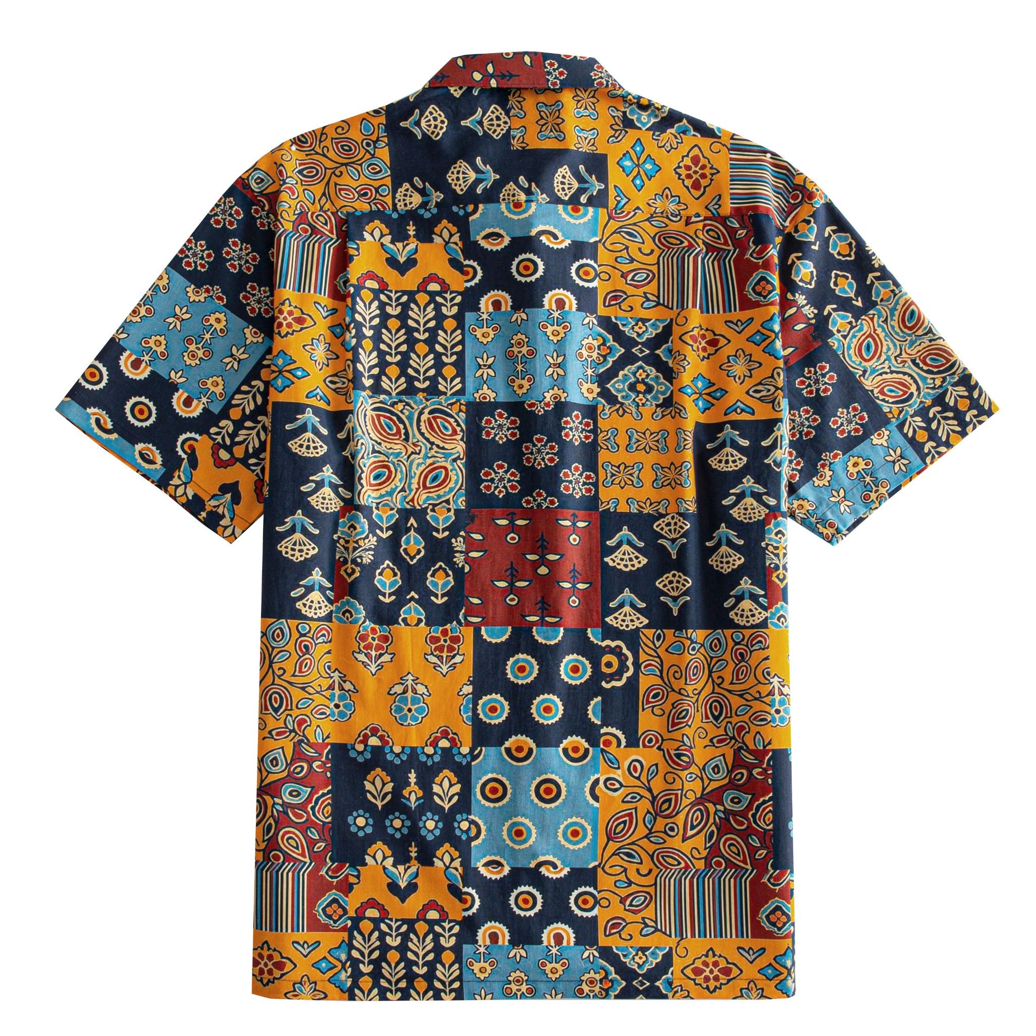 OROMEN Ajrakh Mosaic Hawaiian shirt back flat lay showing full allover patchwork block layout with paisley, sun circles, folk birds and botanical motifs in navy, amber, slate blue and burgundy