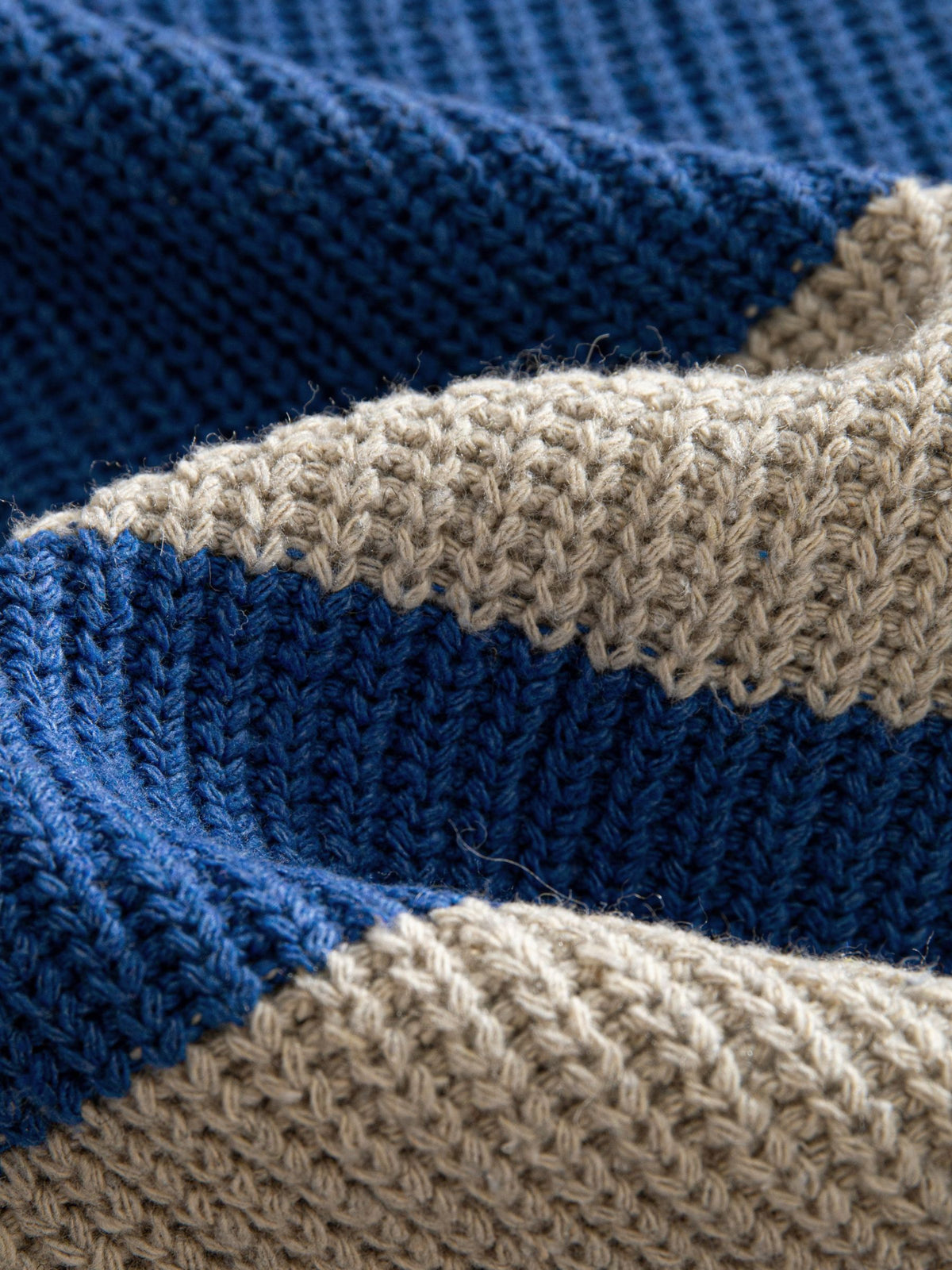 OROMEN Color-Block Striped V-Neck Sweater fabric detail highlighting textured vertical rib knit