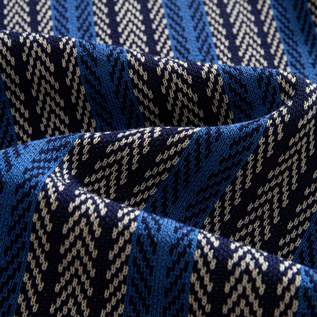 OROMEN Herringbone Jacquard Knit Polo navy blue front hem center detail