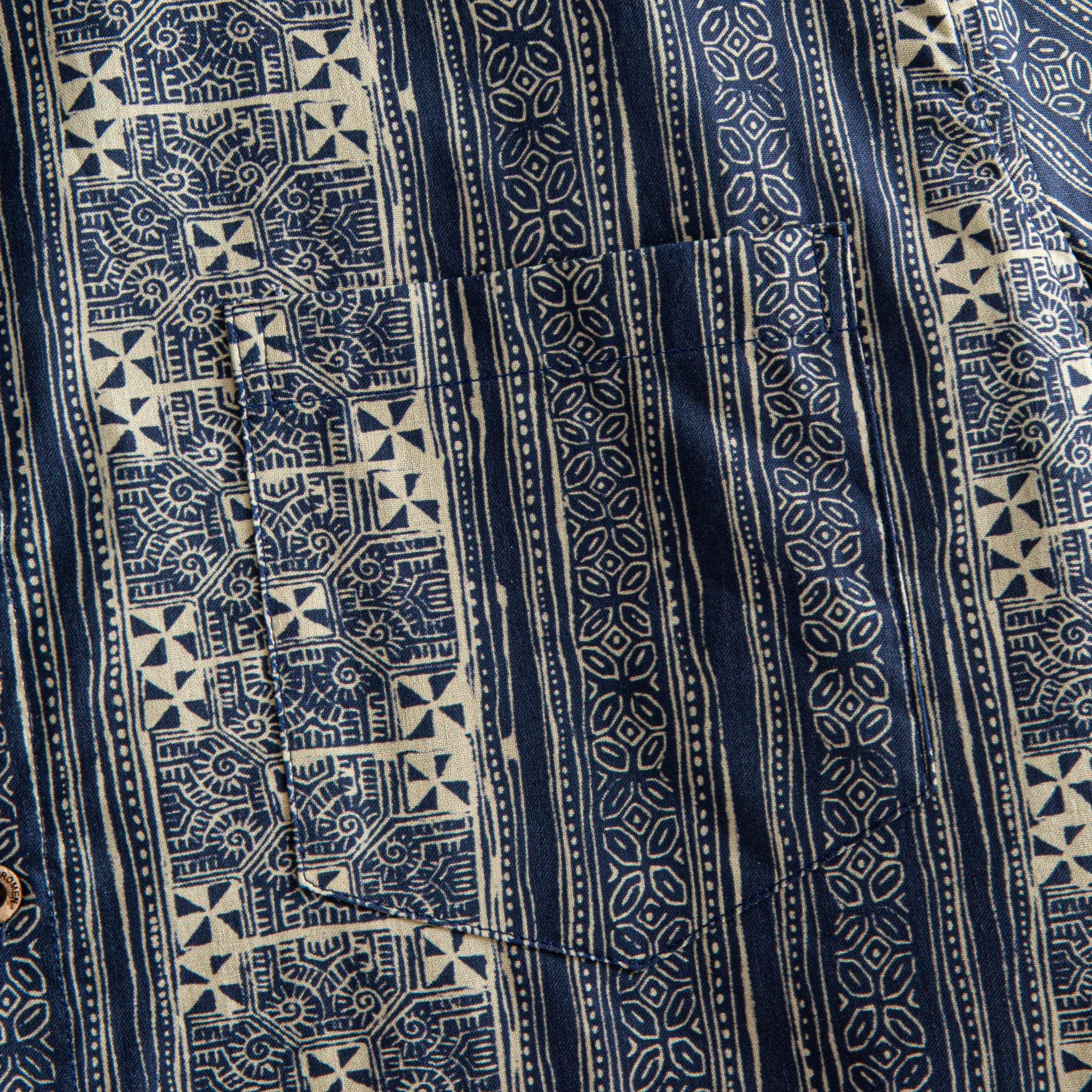 OROMEN Indigo Batik shirt chest pocket detail, navy and off-white Batik geometric stripe print
