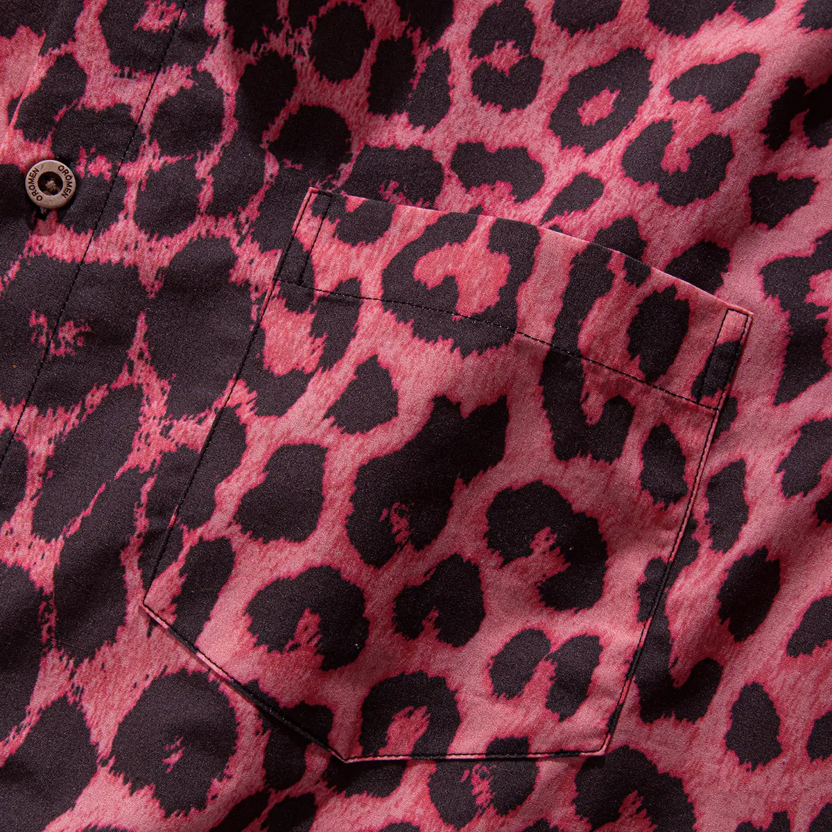OROMEN Pink Leopard Hawaiian Shirt — chest pocket and coconut button close-up