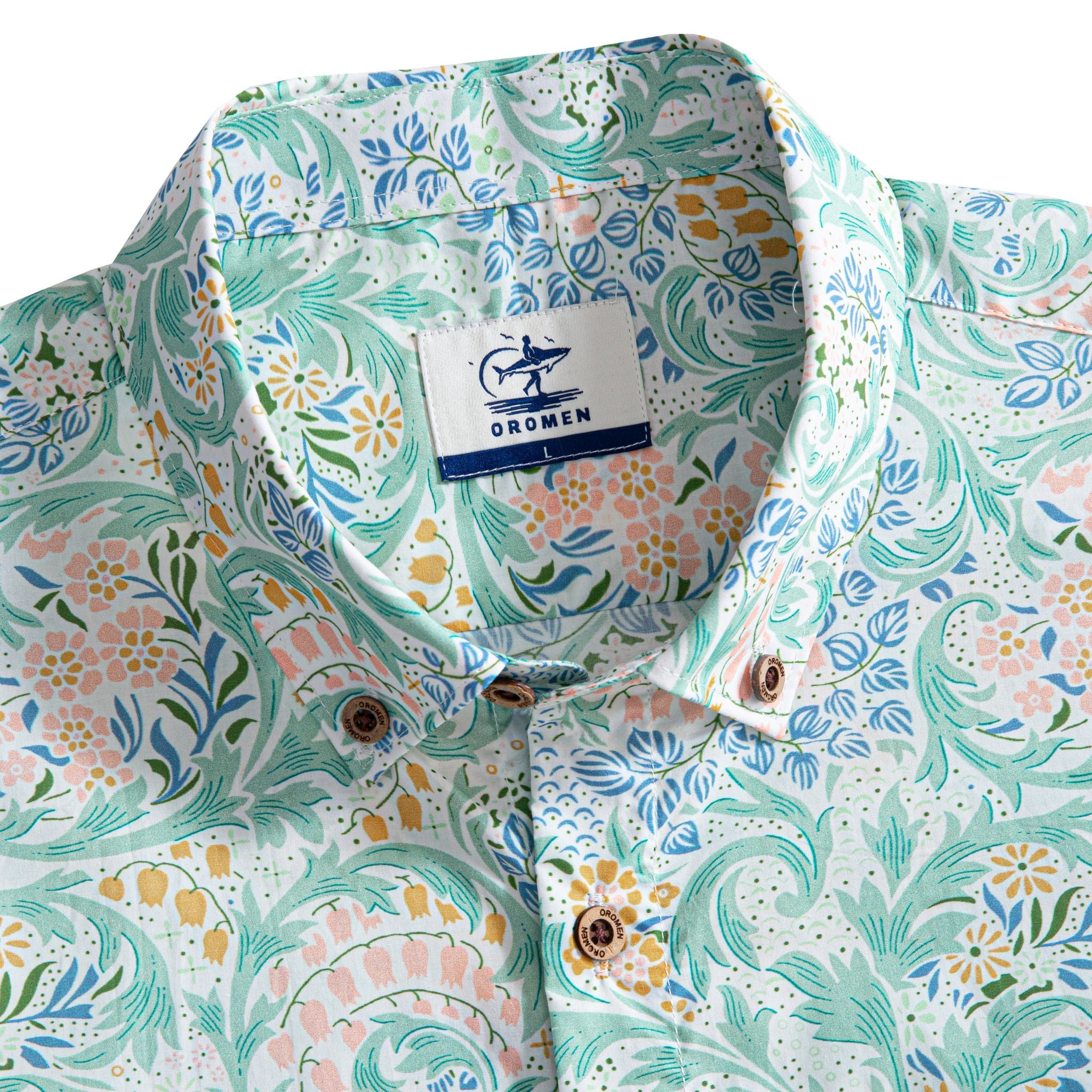 OROMEN Rococo Bloom Hawaiian shirt – brand label and engraved coconut buttons detail on Baroque floral print collar