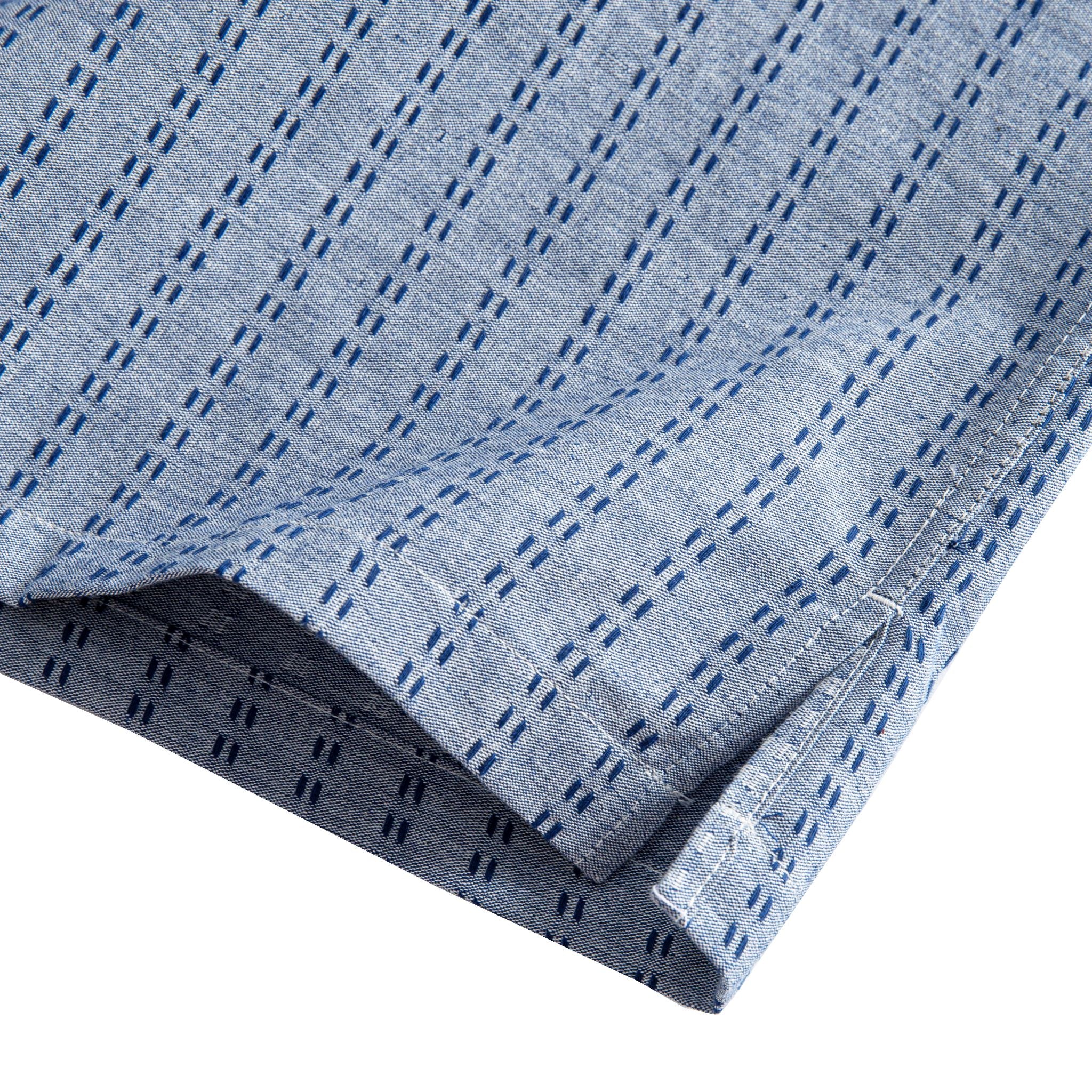 OROMEN Sashiko Chambray shirt side vent and hem detail, navy Sashiko stitch with double needle stitching