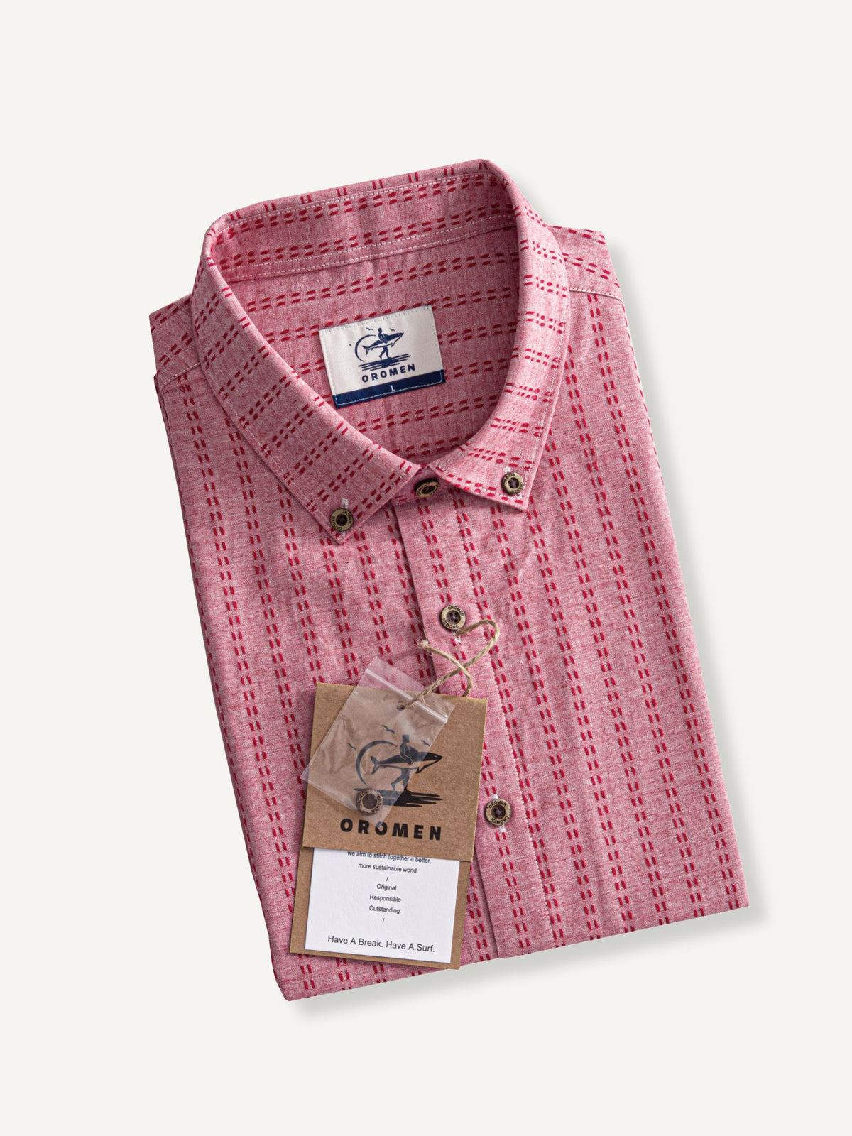 OROMEN Sashiko Cotton Shirt neatly folded flat lay displaying washed coral cotton texture