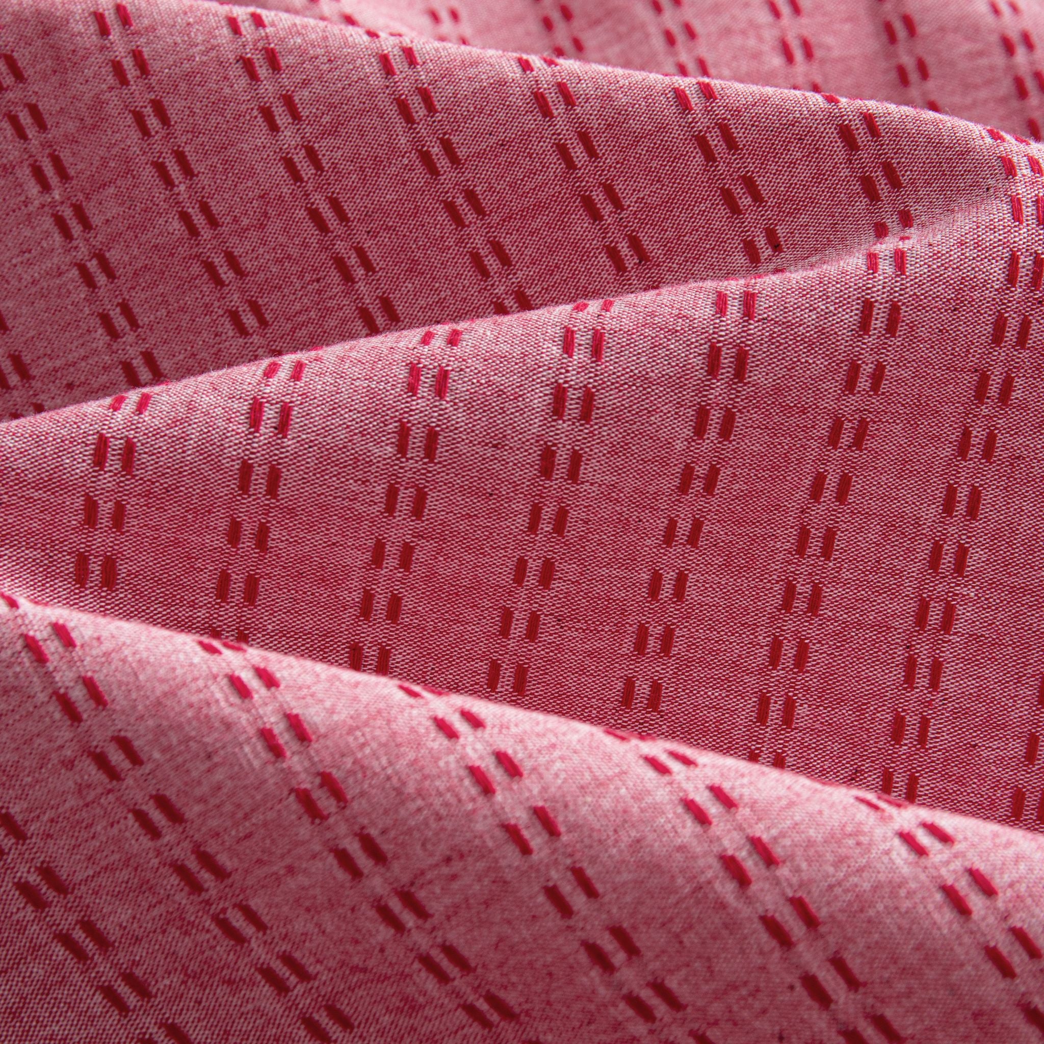 OROMEN Sashiko Stripe shirt fabric close-up, crimson running stitch stripe texture on rose pink cotton