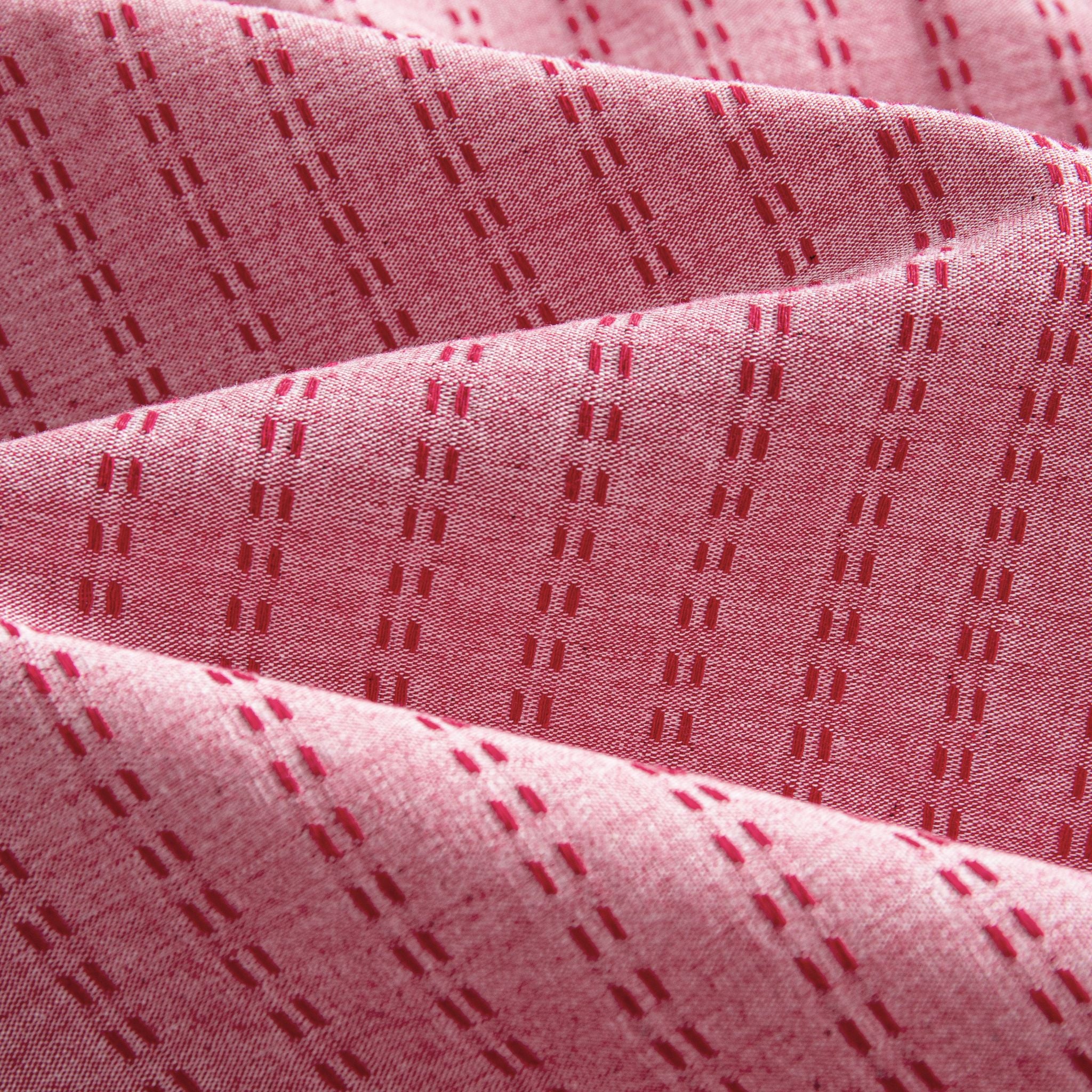 OROMEN Sashiko Stripe shirt fabric close-up, crimson running stitch stripe texture on rose pink cotton