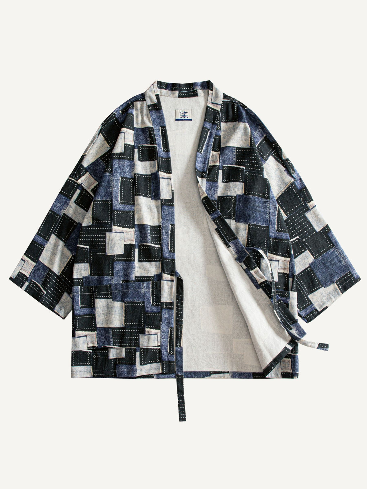OROMEN patchwork kimono cardigan with one front panel open, showing off-white lining