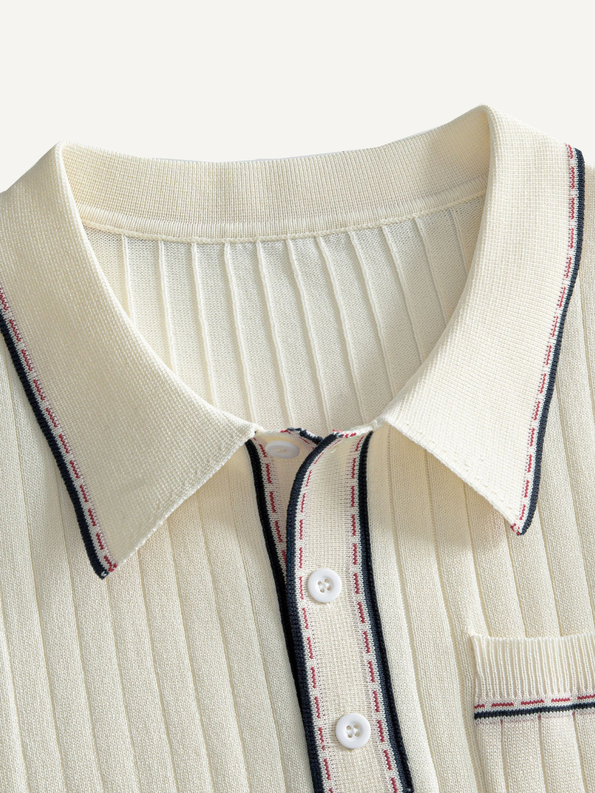 Polo collar and three-button placket detail on OROMEN Cream Court Knit Polo