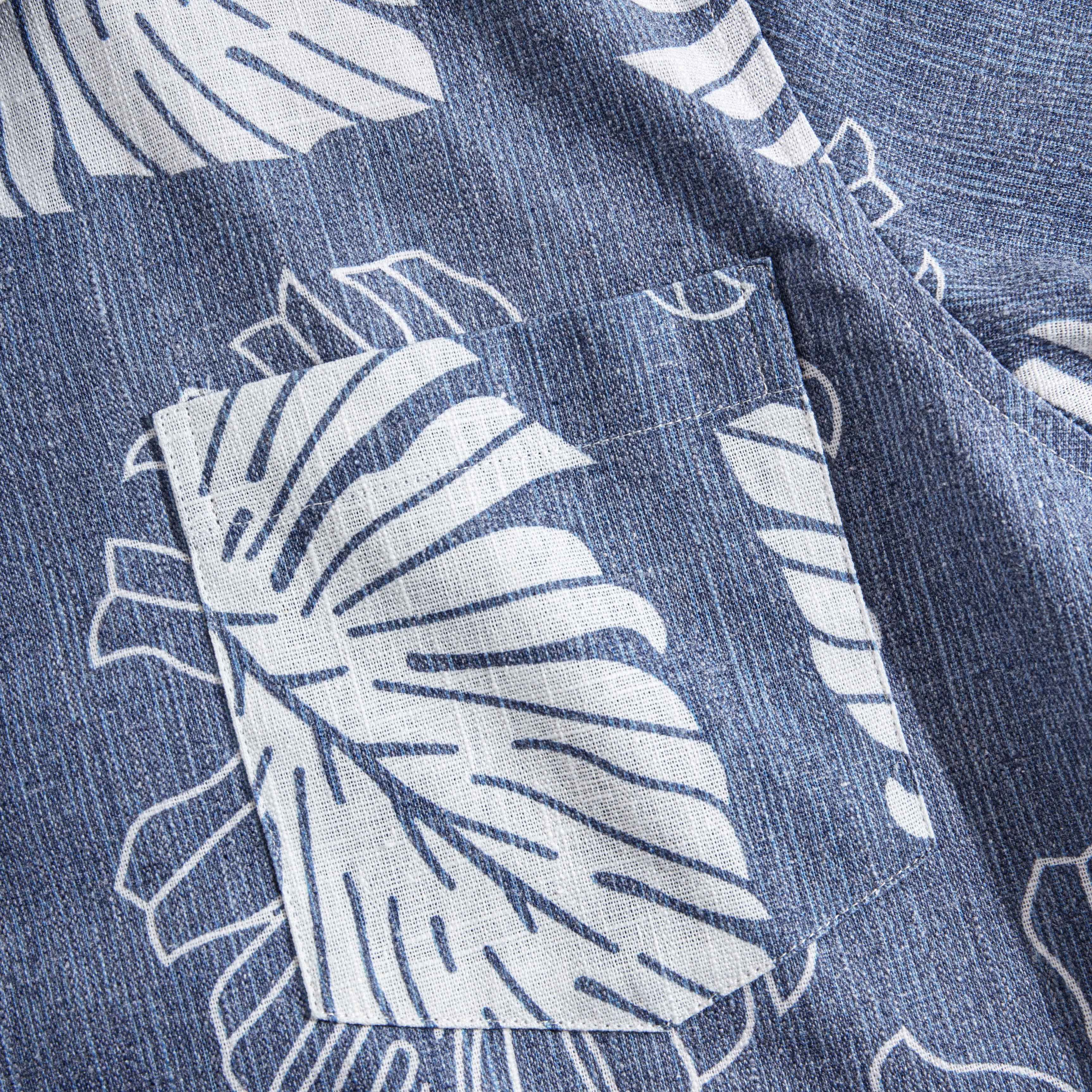 Premium linen fabric texture detail of Monstera Deliciosa shirt