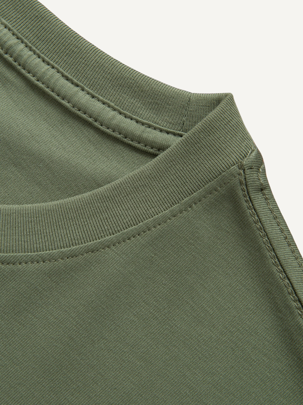 Reinforced double stitching detail along sleeves and hem of OROMEN Wildflower Embroidery T-shirt