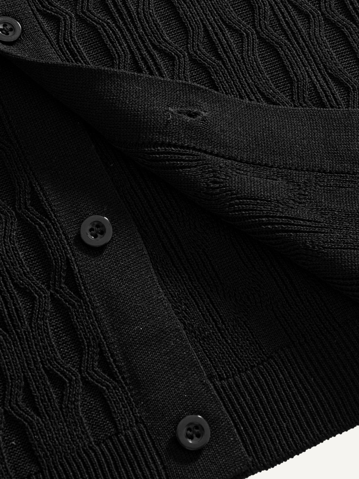 Ribbed bottom hem detail on OROMEN Wave Jacquard Knit Polo