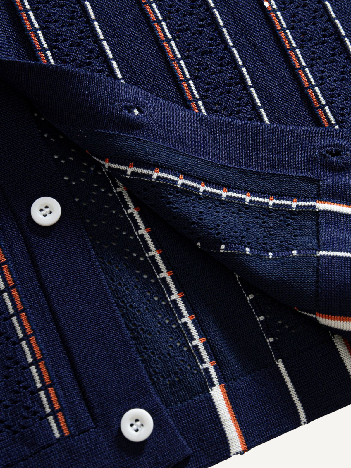 Ribbed hem detail on OROMEN Tally Stripe Open-Knit Shirt
