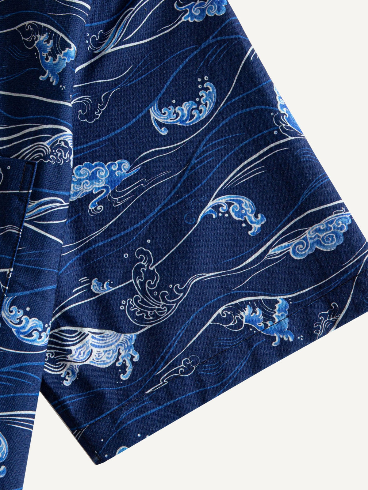 Short sleeve cuff and double-needle stitching detail of OROMEN Hokusai Kairin Shirt