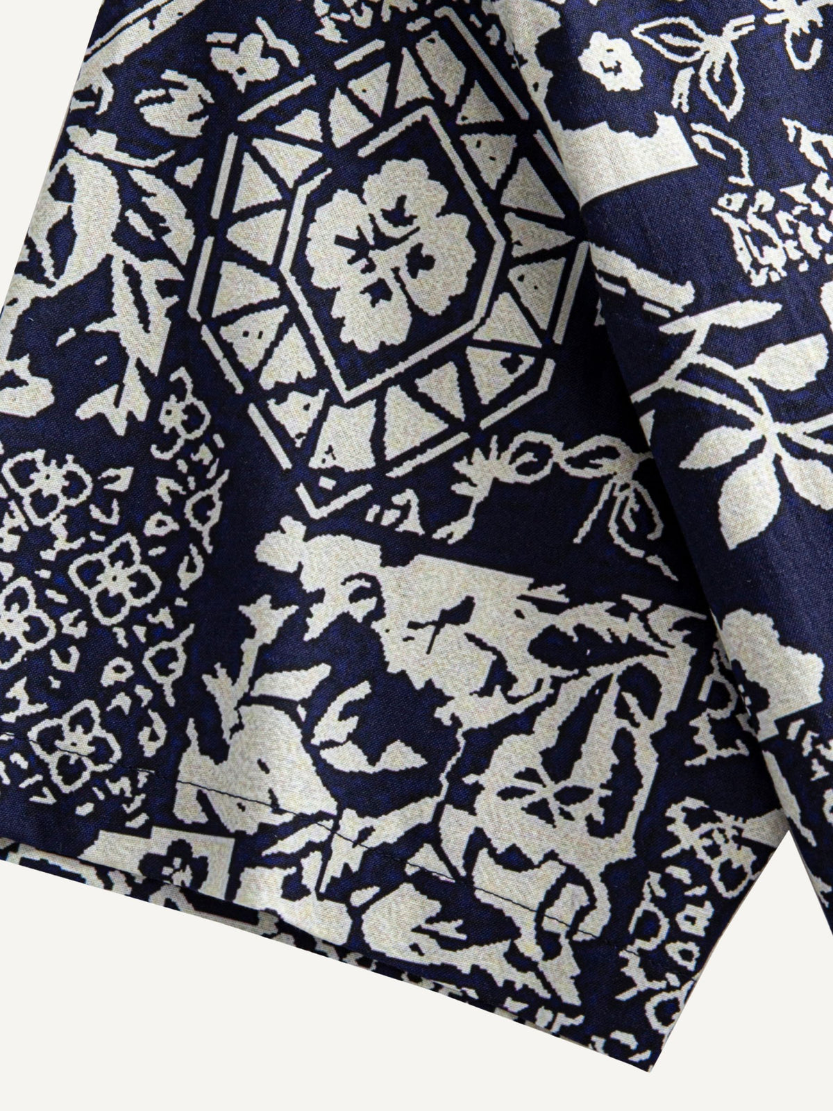 Short sleeve cuff and double-needle stitching detail of OROMEN Indigo Katazome Shirt
