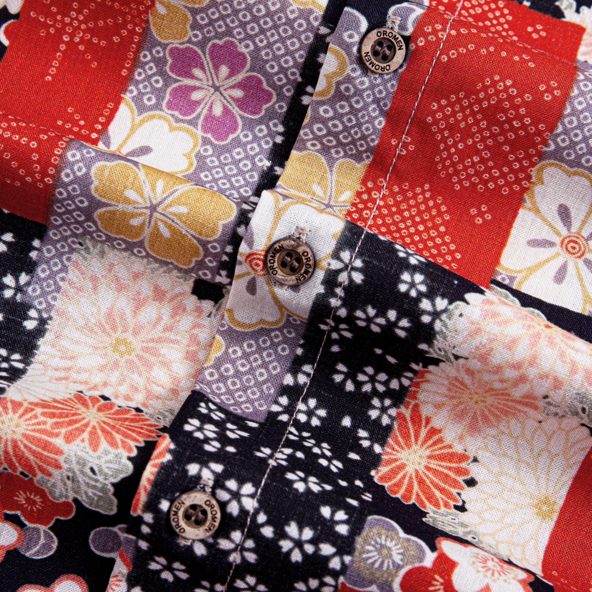 Side detail of Sakura Bokashi shirt featuring vibrant red floral motifs and side vent