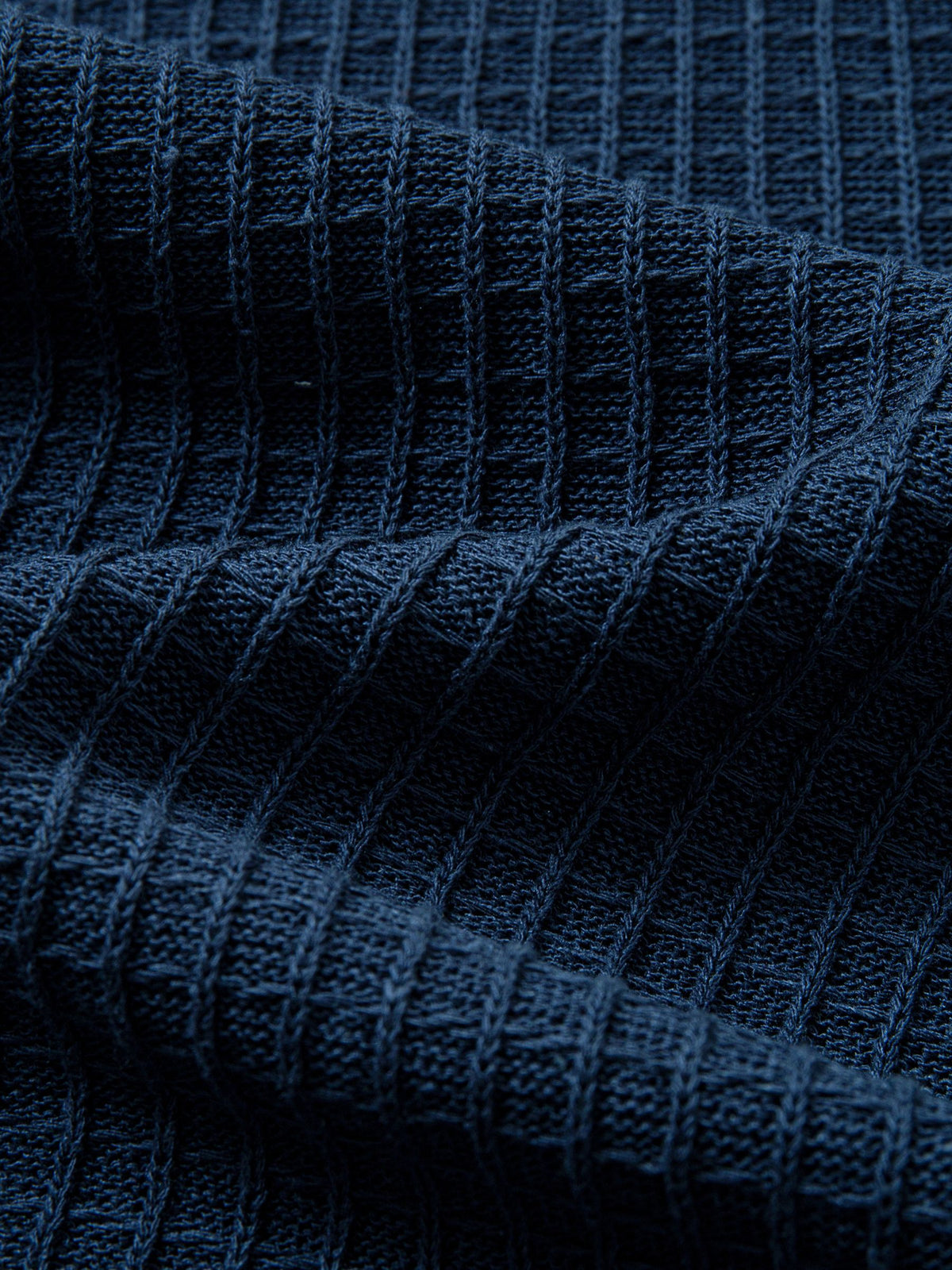 Textured vertical rib knit fabric detail of breathable linen-lyocell blend cardigan