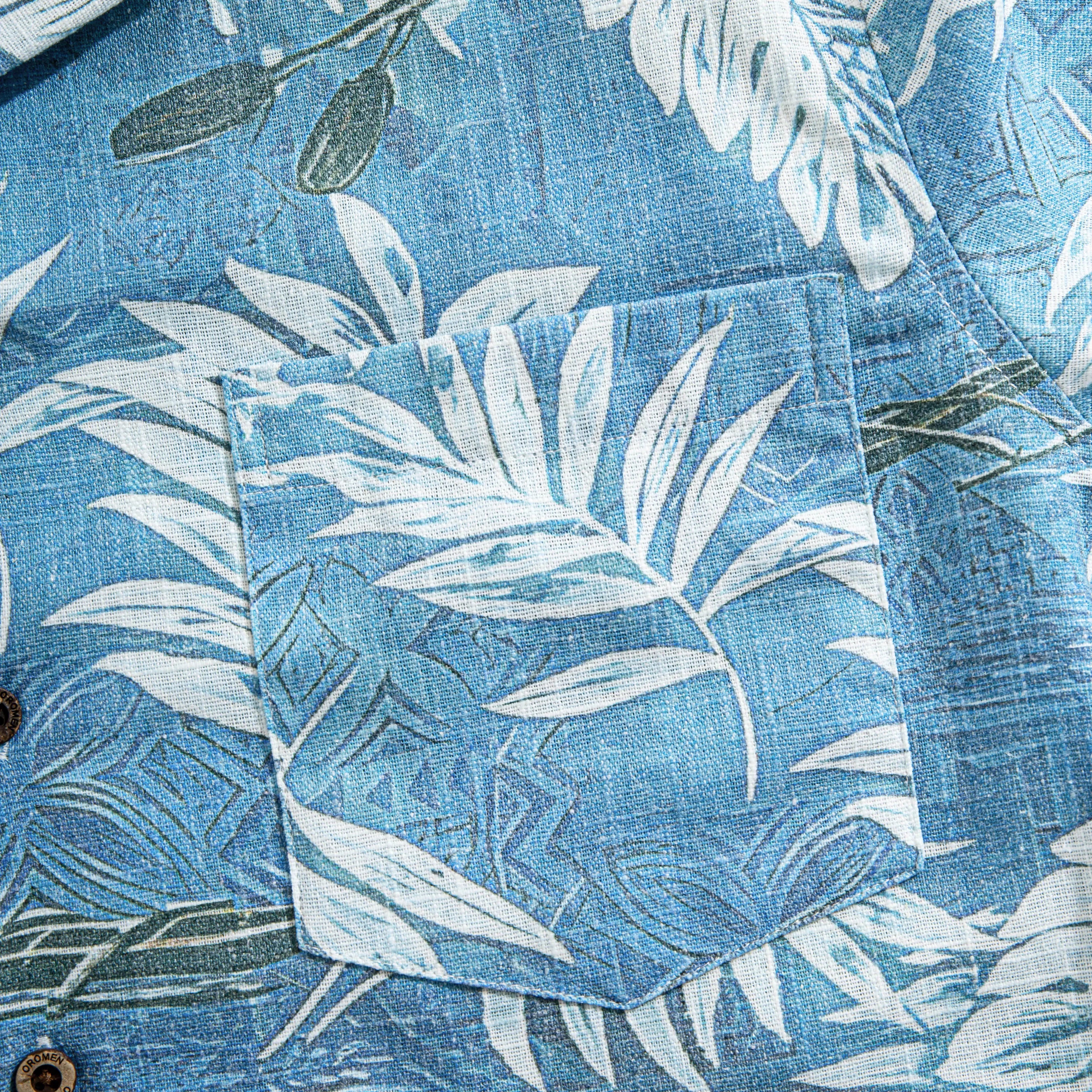 Tropical Totem Aloha Shirt – Chest Pocket Detail Blue Linen-Blend Fabric Texture