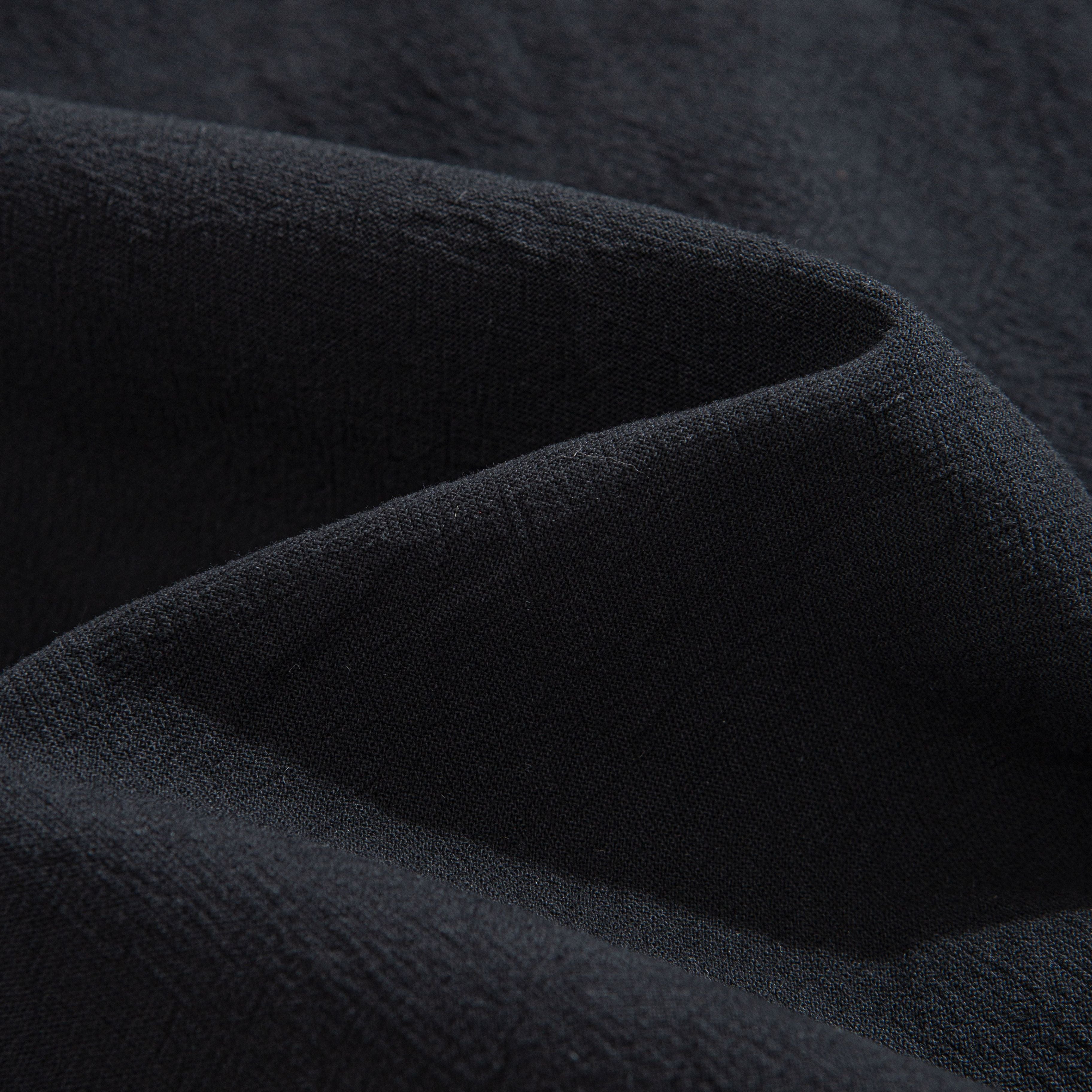 A Rugged Classic Shirt Fabric Texture Close-Up – 100% Cotton