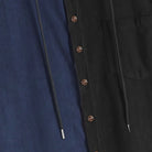 Antique brass button-front placket and white dual drawstrings detail on OROMEN navy black corduroy shirt