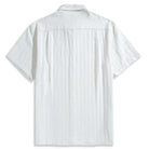 Back view of OROMEN Embossed Striped Shirt – white Tencel™ linen with back box pleat and subtle embossed stripe