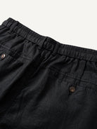 Back waistband detail of OROMEN Crosshatch Weave Drawstring Trousers with elastic waist