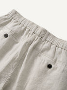 Back waistband detail of OROMEN Crosshatch Weave Relaxed Trousers with elastic waist