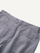 Back waistband detail of OROMEN Pleated Relaxed Fit Linen Trousers with elastic waist