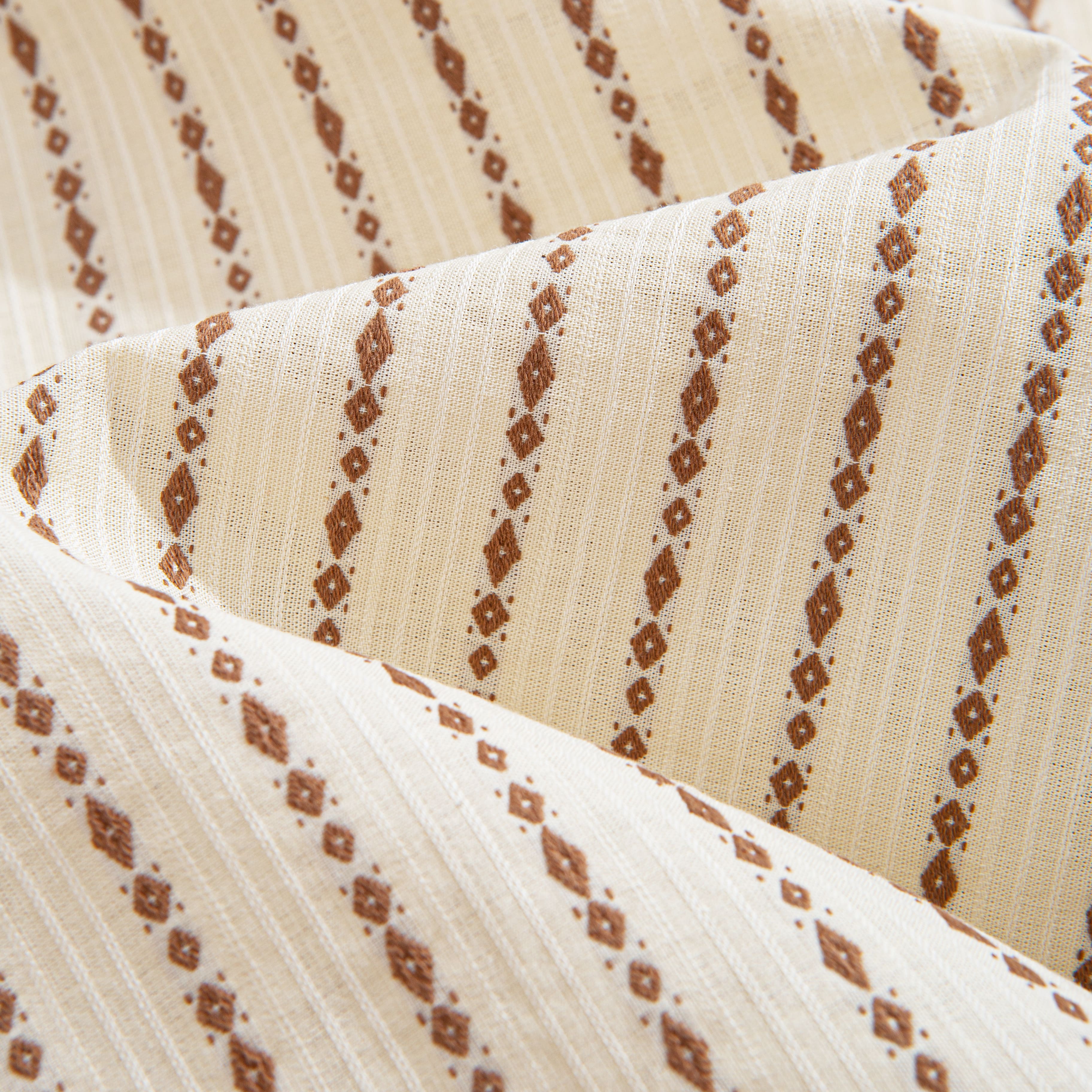 Beige embroidered stripe textured shirt front view